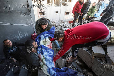 Aftermath of Israeli strike on a house in Nuseirat, in the central Gaza Strip