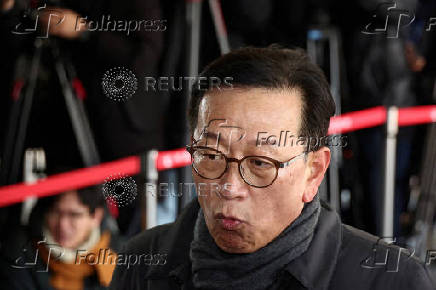 Seok Dong-hyeon, a lawyer for South Korea's impeached President Yoon Suk Yeol, arrives at a court, in Seoul