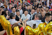 FILE PHOTO: Singapore's fourth Prime Minister, Lawrence Wong, meets supporters at a community event after the swearing-in ceremony in Singapore