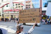 Protesters gather outside the Toronto International Film Festival (TIFF) screening of 'Russians at War', in Toronto