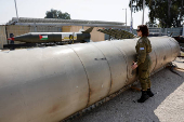 Israel's military displays what they say is an Iranian ballistic missile which they retrieved from the Dead Sea