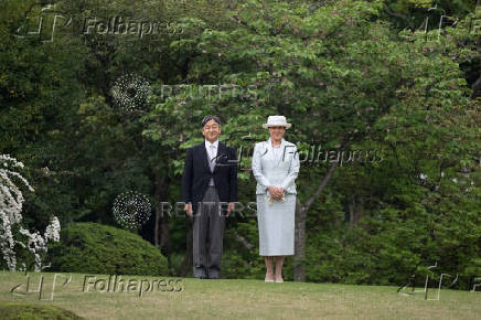 Japan's Emperor Naruhito and Empress Masako attend the spring garden party at the Akasaka Palace Imperial garden, in Tokyo