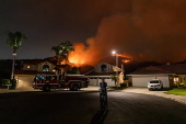 Firefighters battle 'Airport Fire' wildfire in California