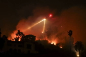 Firefighters battle the Sunset Wildfire in Los Angeles, California