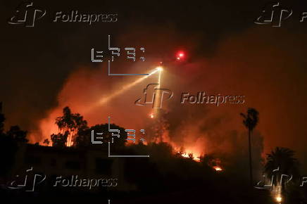 Firefighters battle the Sunset Wildfire in Los Angeles, California