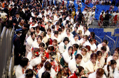 Youth including the Kimono-clad women leave the venue after their Coming of Age Day celebration ceremony in Yokohama