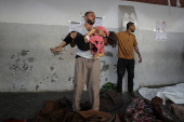 Gazans mourn loved ones killed in an Israeli strike