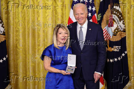 U.S President Biden gives the Presidential Citizens Medal, one of the country's highest civilian honors, during a ceremony at the White House in Washington