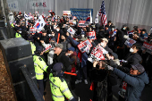 Pro-Yoon protesters participate in a rally outside a court, in Seoul