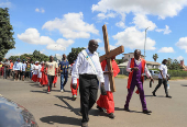 Members of the Roman Catholics commemorate Good Friday during the start of Easter in Harare