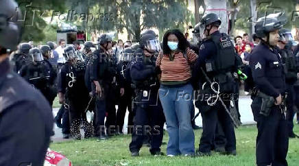 Police arrest a pro-Palestinian protester at the USC campus in Los Angeles
