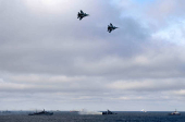 FILE PHOTO: Russian Navy's ships and jet fighters are seen during the joint drills of the Northern and Black Sea fleets, in the Black Sea, off the coast of Crimea