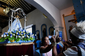 Cuban faithful carry out the traditional procession of the Virgin of Regla