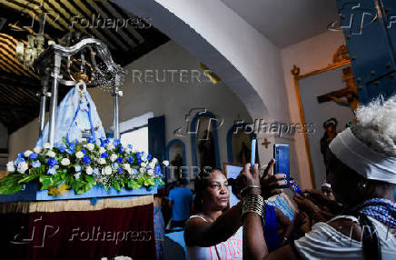 Cuban faithful carry out the traditional procession of the Virgin of Regla