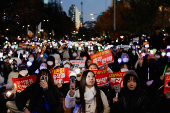 Protesters take part in a rally calling for the impeachment of South Korean President Yoon Suk Yeol, in Seoul