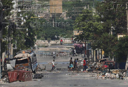 Haiti's capital almost completely cut off by blockades as gang violence intensifies, in Port-au-Prinxe
