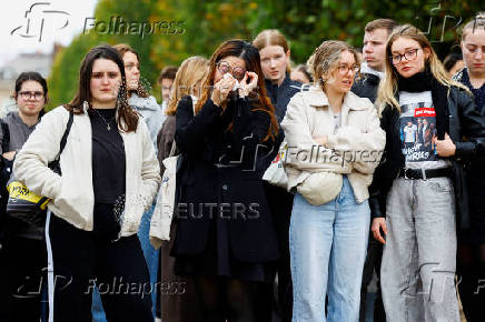 Fans gather and place tributes to former One Direction singer Liam Payne in Paris