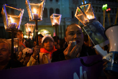 Demonstrators hold a vigil ahead of International Day for the Elimination of Violence Against Women, in Guatemala City