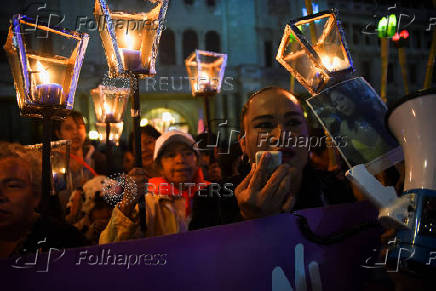 Demonstrators hold a vigil ahead of International Day for the Elimination of Violence Against Women, in Guatemala City