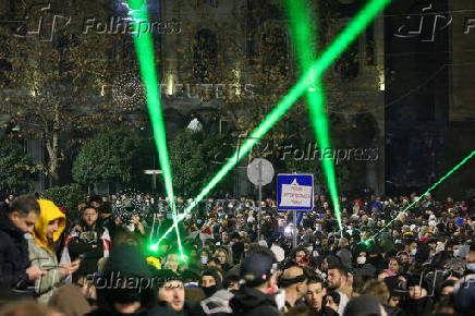 Georgian opposition supporters protest against government's EU application delay, in Tbilisi