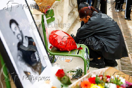 Fans gather and place tributes to former One Direction singer Liam Payne in Paris