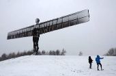 Snowfall at Antony Gormley's Angel of the North, in Gateshead