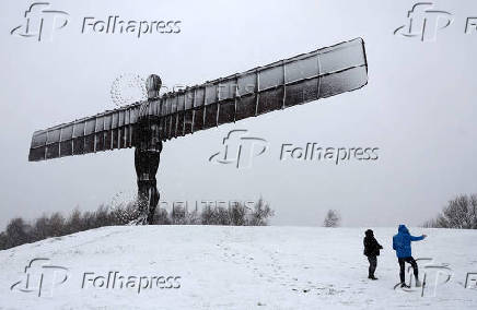 Snowfall at Antony Gormley's Angel of the North, in Gateshead