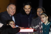 Paris Olympics chief Estanguet turns on Christmas lights on the Champs Elysees