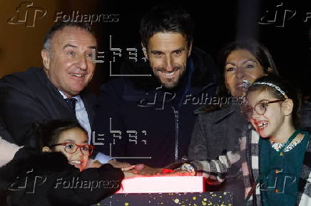 Paris Olympics chief Estanguet turns on Christmas lights on the Champs Elysees