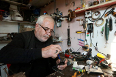 Marwan Mahmoud, father of Joan Marwan, who was imprisoned in Syria for 13 years and was still alive when rebels opened the prison gates after entering Damascus, works in his workshop in Duhok