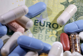 Illustration shows Euro banknote and medicines