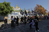 Ukrainians take part in procession for the 'Day of Defenders of Ukraine' in Kyiv