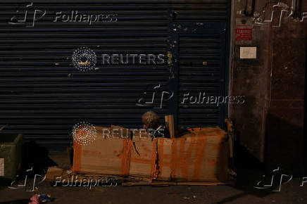 Anjos da Noite (Night Angels) NGO distributes food to homeless people on Christmas Eve in Sao Paulo