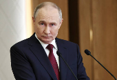 Russian President Putin attends a press conference in Astana