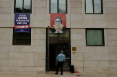 Far-right political party Chega expose banners on the facade of the Portuguese parliament against the wage reinstatement for politicians after the cuts imposed by the Troika, during the debate and vote of the 2025 budget bill on final reading, in Lisbon