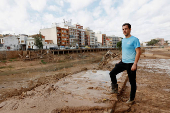 Flood-affected residents share opposite views on the Valencia marathon