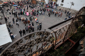 People gather outside the Umayyad Mosque, in Damascus