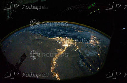 FILE PHOTO: The lights of Cairo, Alexandria and the Nile River seen from the International Space Station
