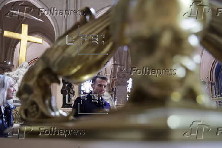 French President Macron visits Notre-Dame in Paris