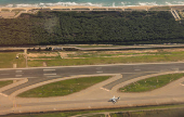 An aerial view shows new vehicles parked at the port in Barcelona