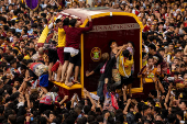 Filipino Catholic devotees parade 