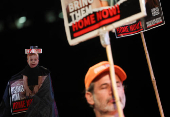 People gather to mark the second birthday of the youngest hostage in Gaza, Kfir Bibas, in Tel Aviv