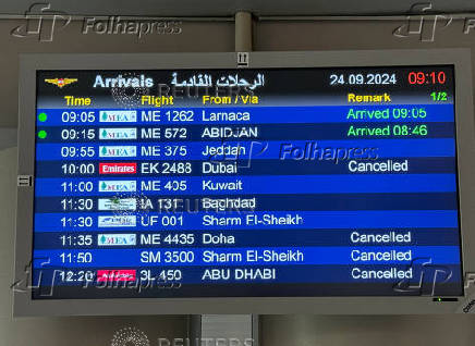 An information board shows some cancelled flights, at the Beirut-Rafic Hariri International Airport