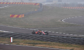 Lewis Hamilton drives a Ferrari F1 car around the Fiorano circuit as part of the TPC tests