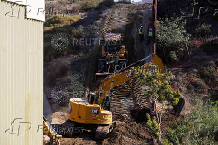 Construction to replace primary fence on the Mexico-U.S. border, as seen from Tijuana