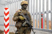 Polish Prime Minister Donald Tusk visits reinforced barrier at the Polish-Belarusian border