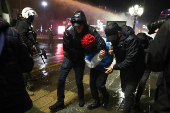 People take part in a protest on the day Istanbul Mayor Imamoglu was jailed as part of a corruption investigation, in Ankara
