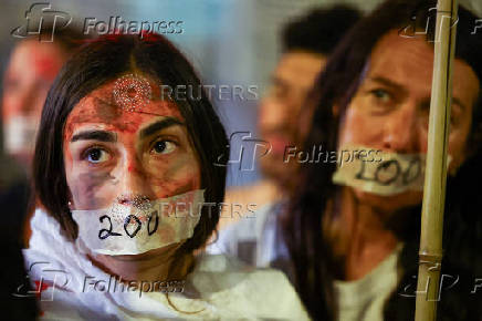 Family members of hostages protest to mark 200 days since the start of the conflict between Israel and Hamas, in Tel Aviv
