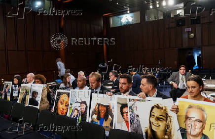 FILE PHOTO: Family members attend as Boeing's Muilenburg testifies before Senate Commerce, Science and Transportation hearing on grounded 737 MAX on Capitol Hill in Washington