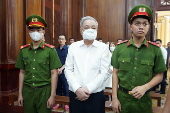 Vietnam jails soft drinks tycoon Tran Qui Thanh for eight years in $40m fraud case